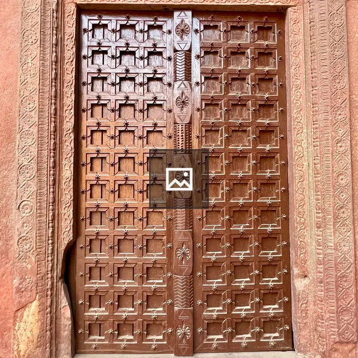 Wooden door with Mughal carving