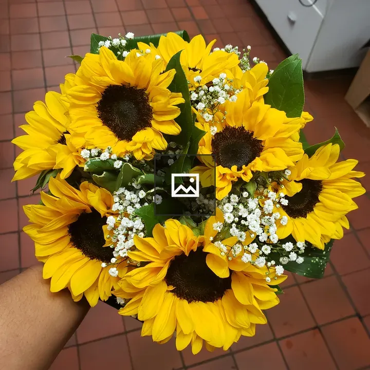 Top of bridal bouquet with sunflowers