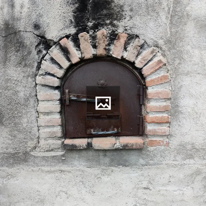 Old brick oven in square setting