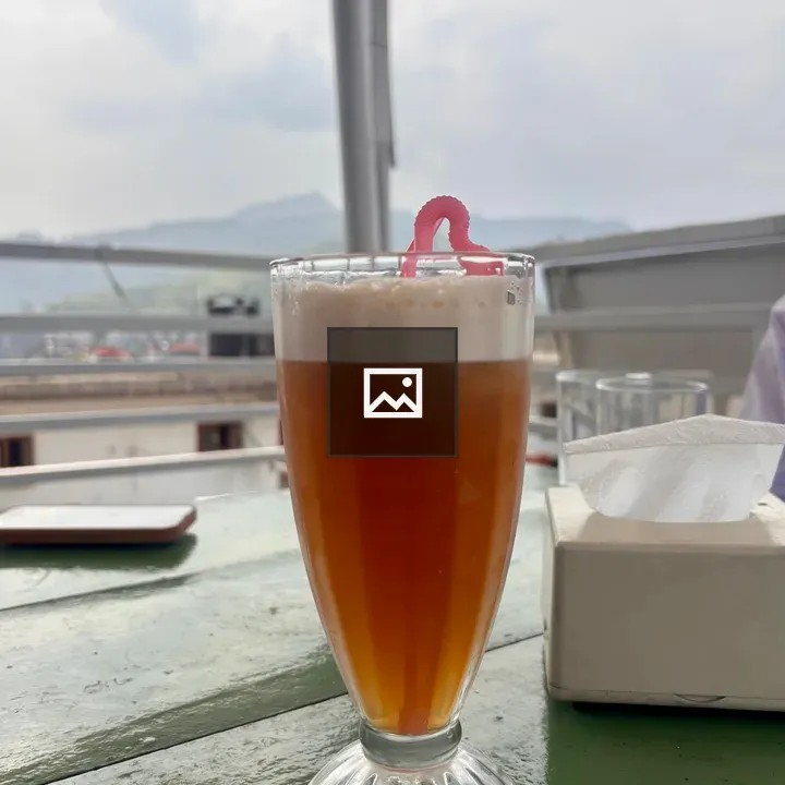 Amber beer with worm garnish