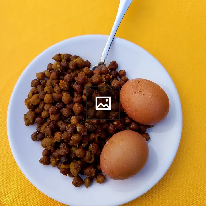 Chickpeas with Eggs on Plate