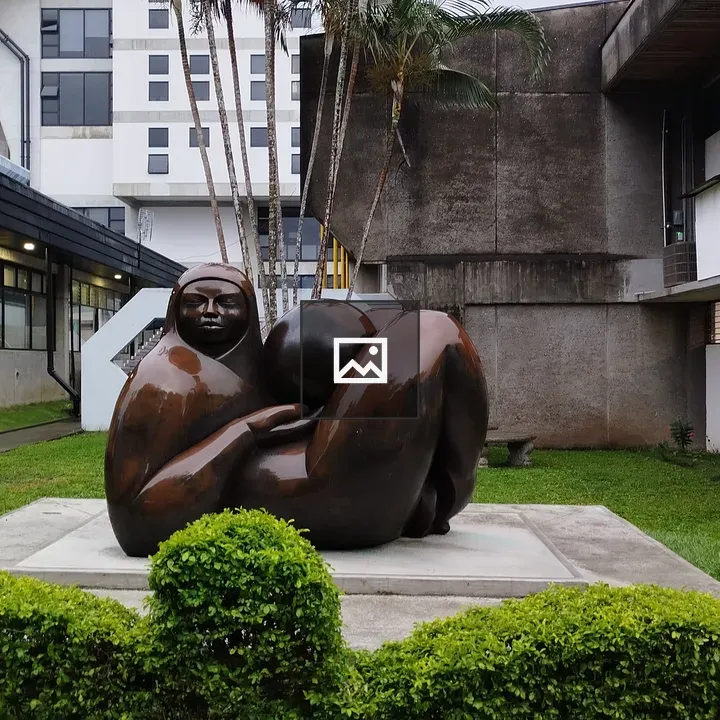 Sculpture in a grassy courtyard