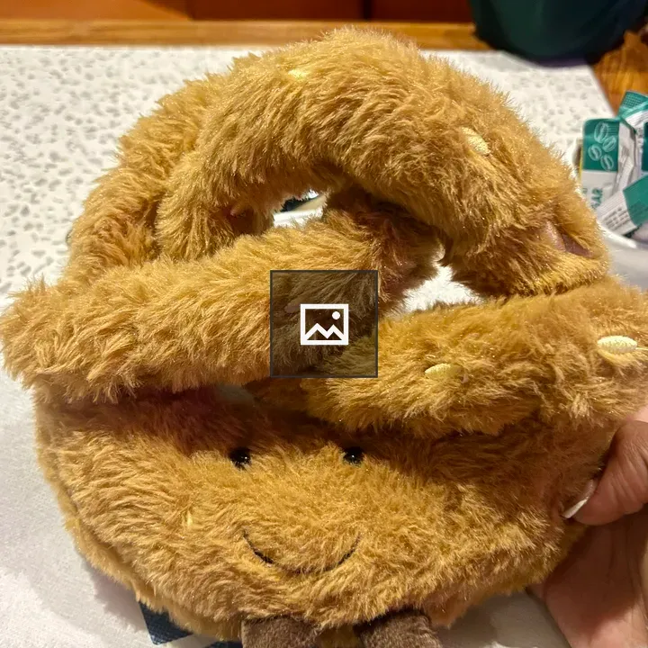 Person with large pretzel