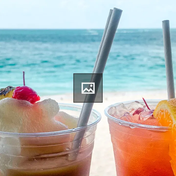 Two colorful drinks at the beach