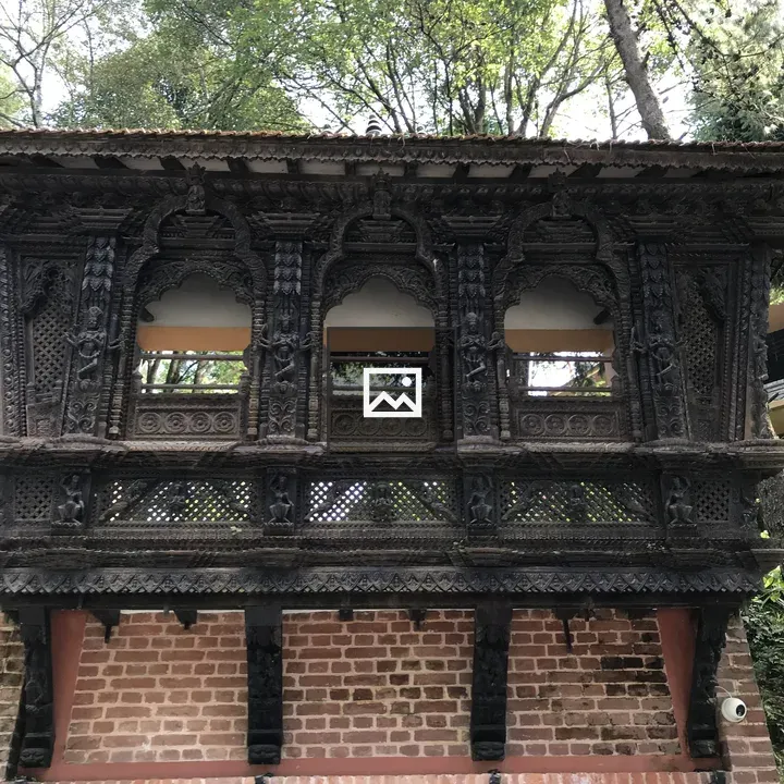 Traditional Nepalese Building with Carvings