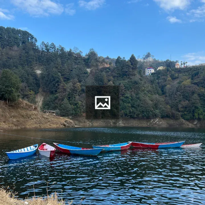 Colorful boats on a tranquil lake