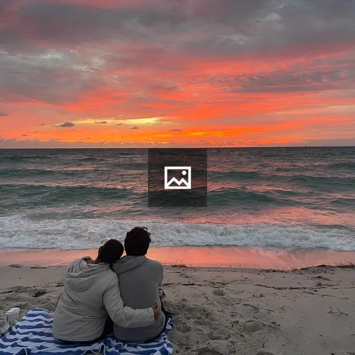 Couple on Beach at Sunset