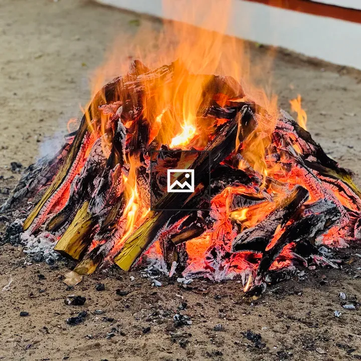 Bonfire with Embers on Sand