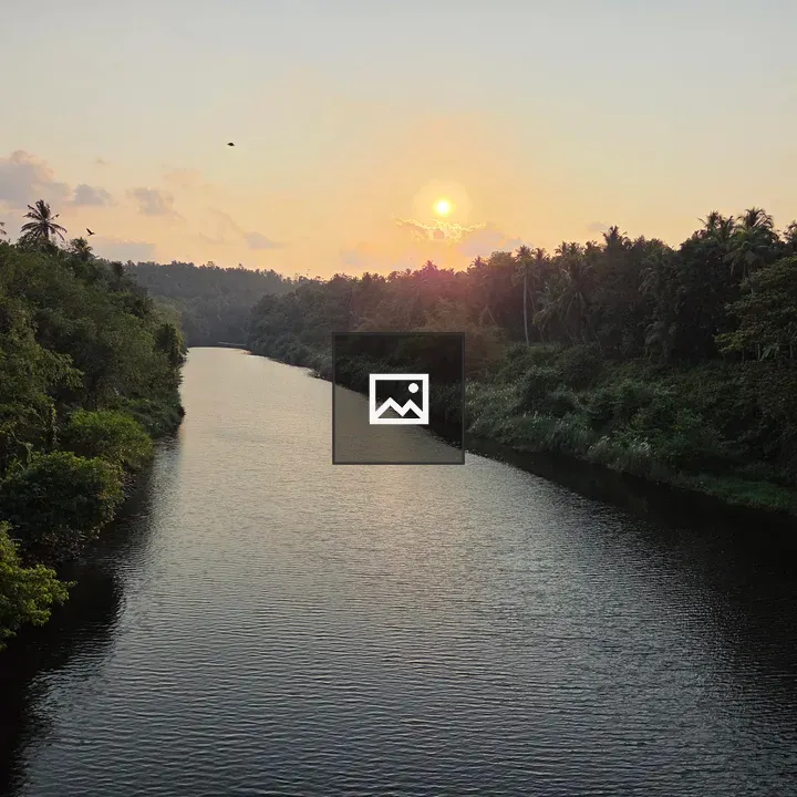 Serene river at sunset