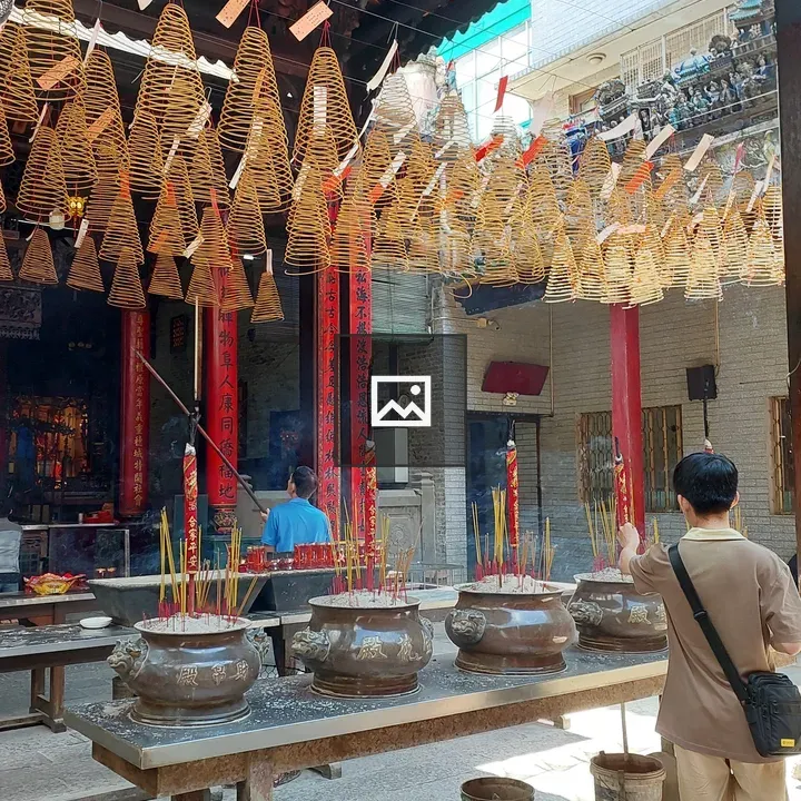 Incense Ceremony in Temple Courtyard