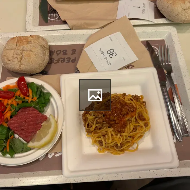 Pasta and steak tartar on a plate