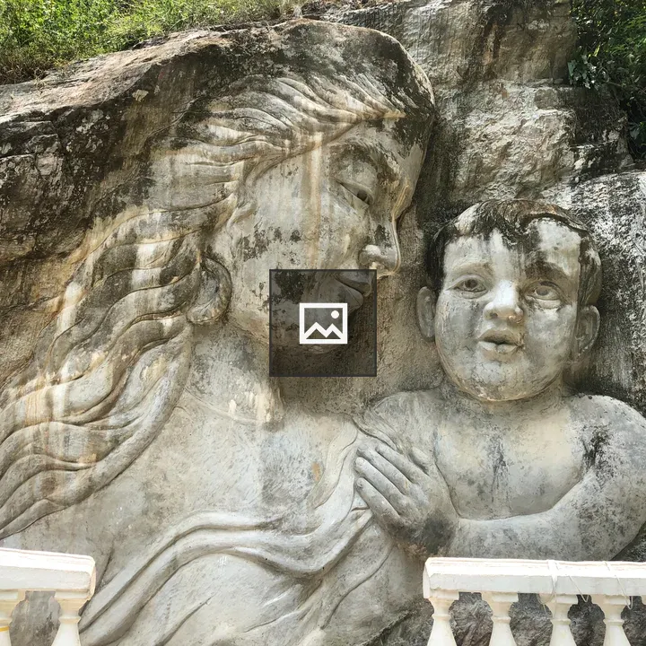 Stone Relief Carving of Woman and Child