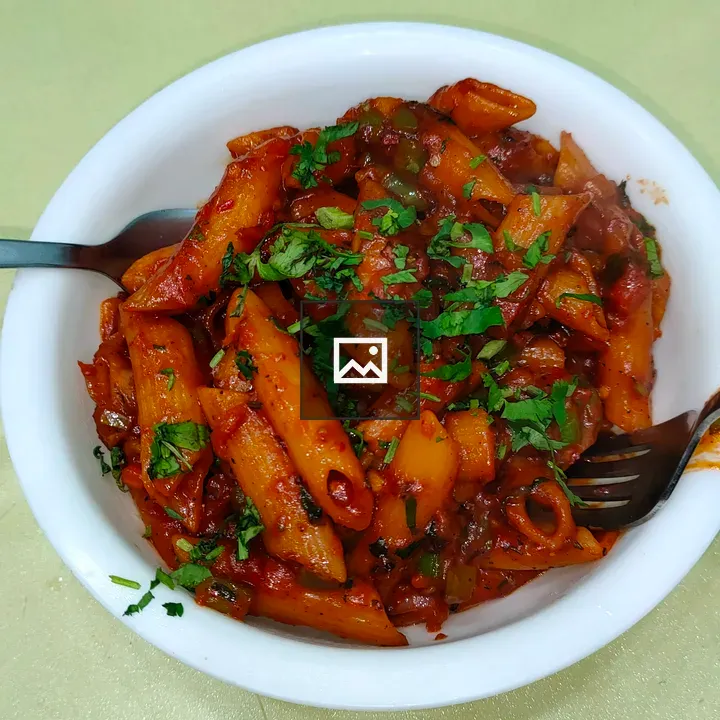 Red sauce pasta in plate