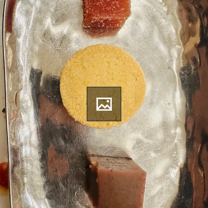 Three pieces of dessert on a tray