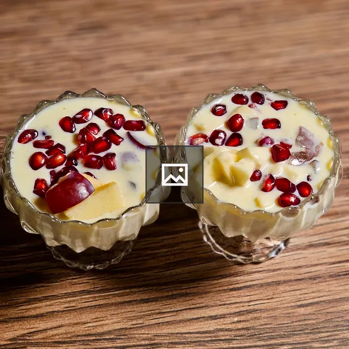 Two Custard Desserts in Glass Bowls
