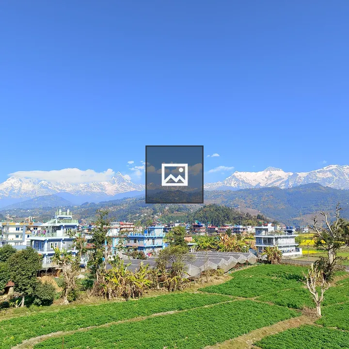Panoramic Town with Snow Mountains