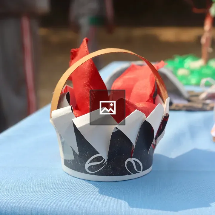 Handmade Paper Crown on Blue Cloth