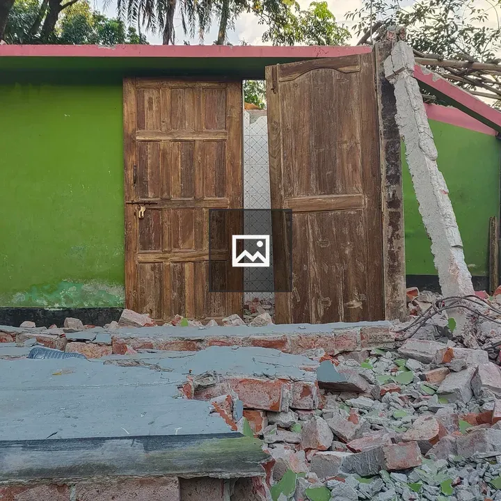 Collapsed house after earthquake