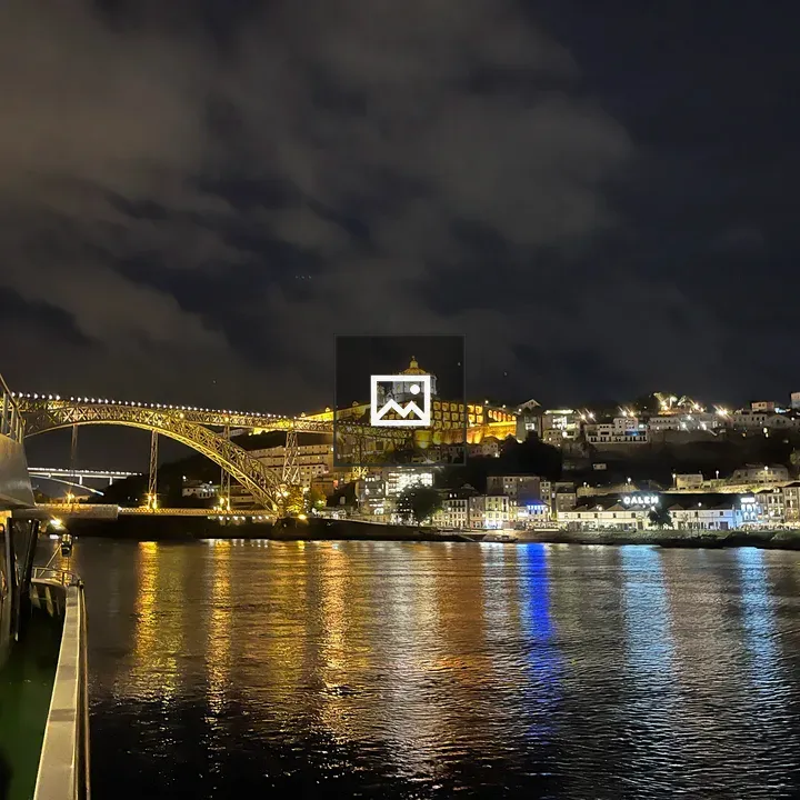 Castle on a hill at night in Porto