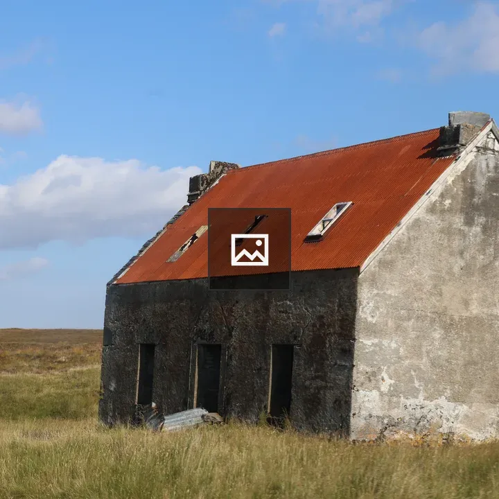 Old ruin with tin roof in highlands