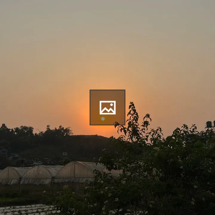 Serene Sunset Over Rural Landscape