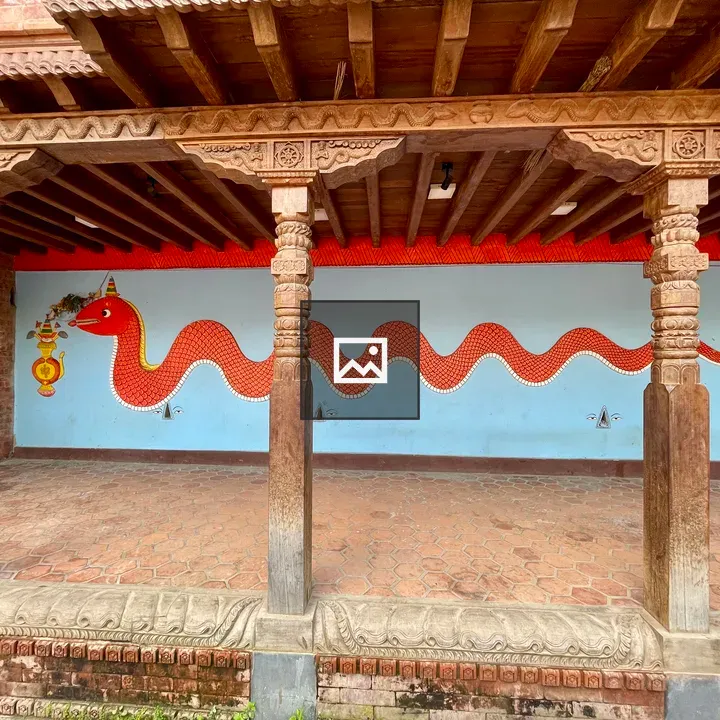 Red snake mural at Patan Durbar Square