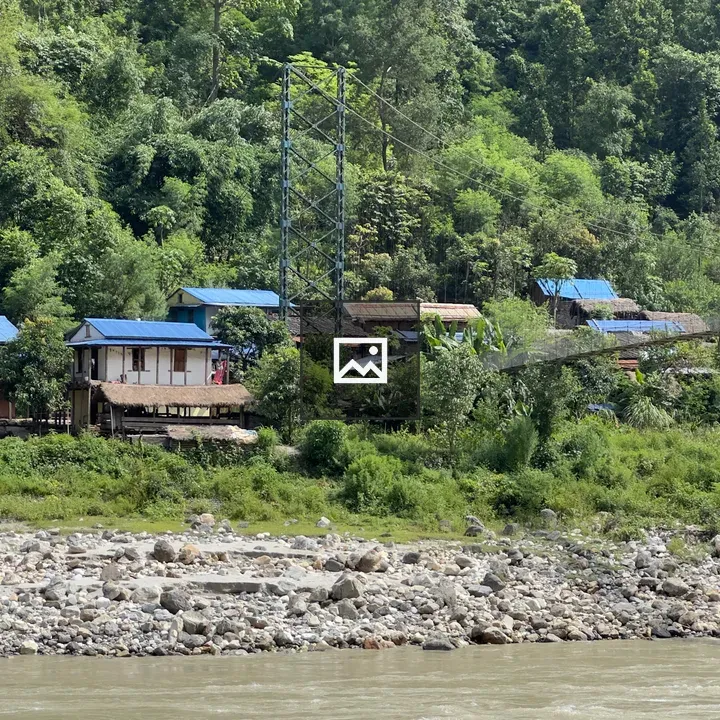 Village by the river with bridge