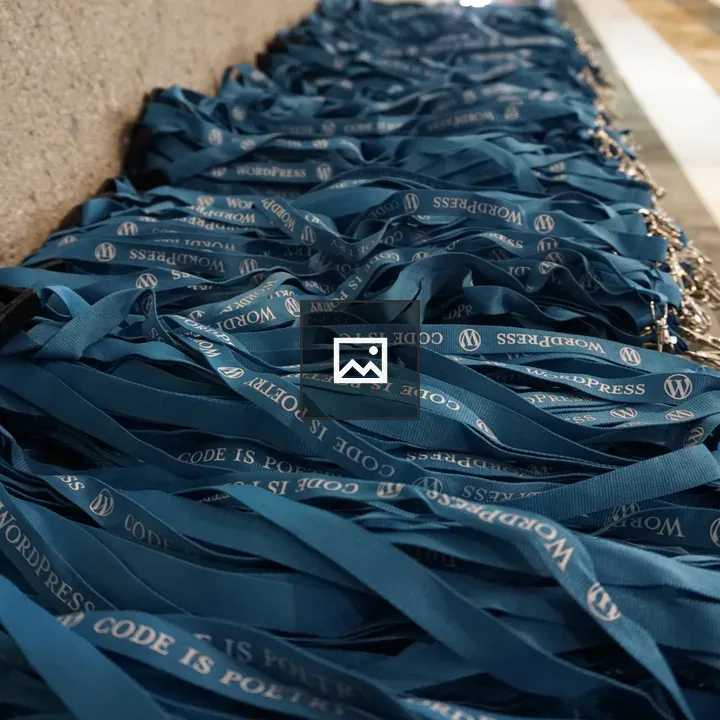 Pile of WordCamp lanyards