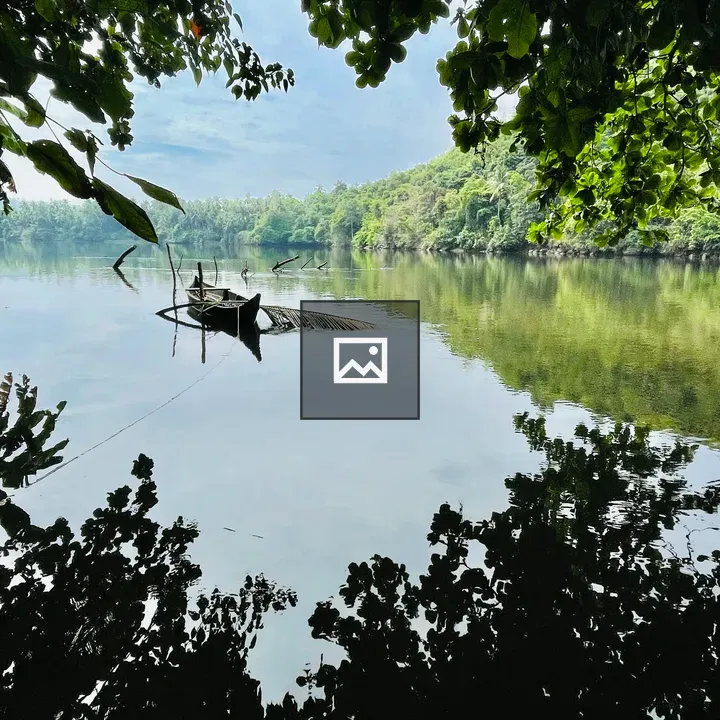 Small open boat on river Chaliyar