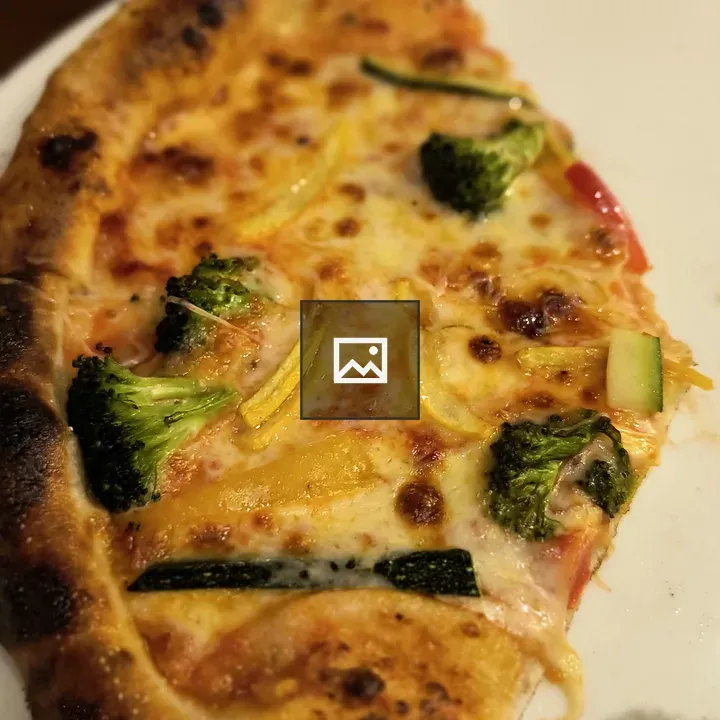 Slice of pizza with toppings
