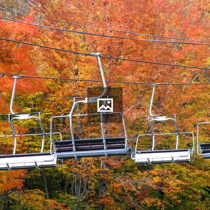 Ski lift chairs in autumn