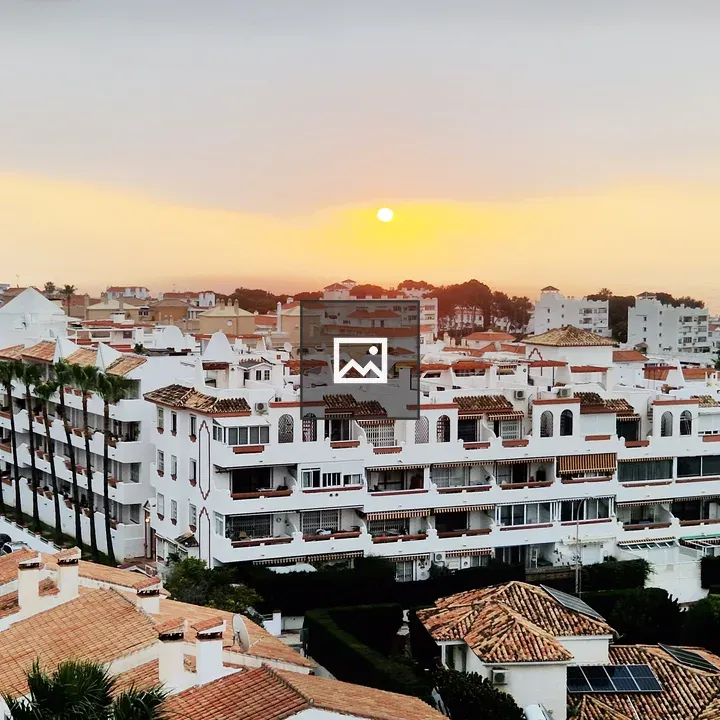 Coastal Town Sunrise Skyline