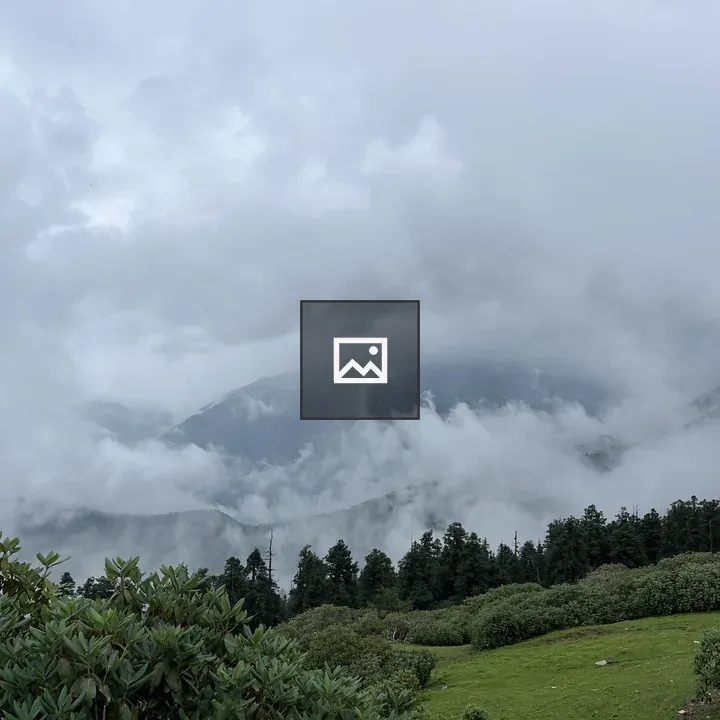 Portrait of green valley beneath clouds
