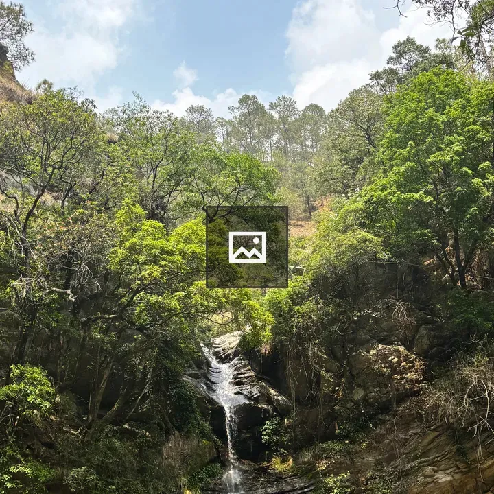 Waterfall over rocky cliff