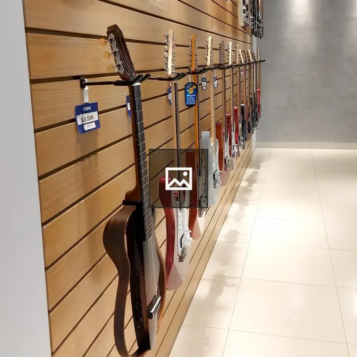 Guitars on Wooden Wall