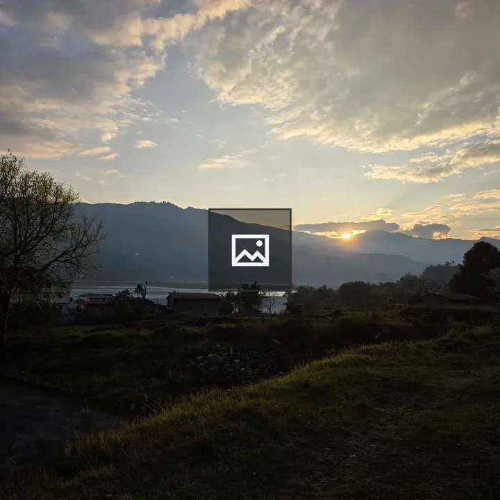 Sunrise over silhouetted landscape