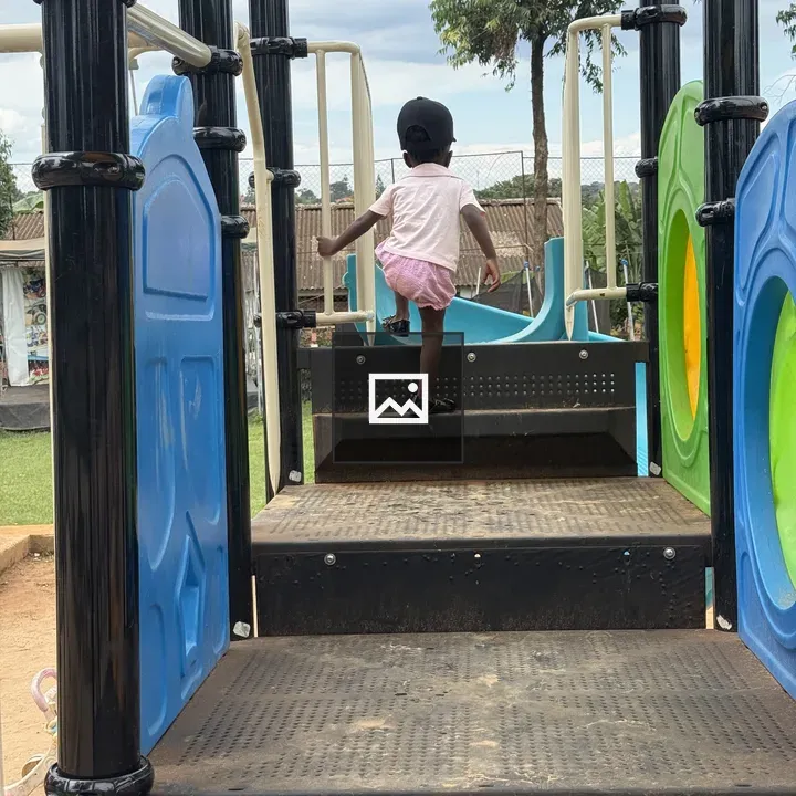 Child Climbing Playground Steps