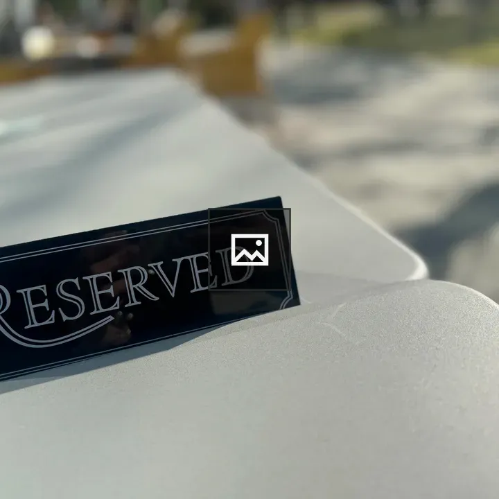 Reserved sign on outdoor table