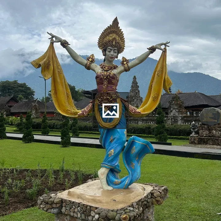 Balinese dancer statue in garden