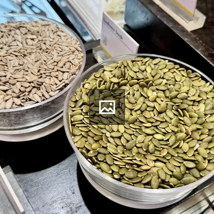 Two glass bowls with seeds