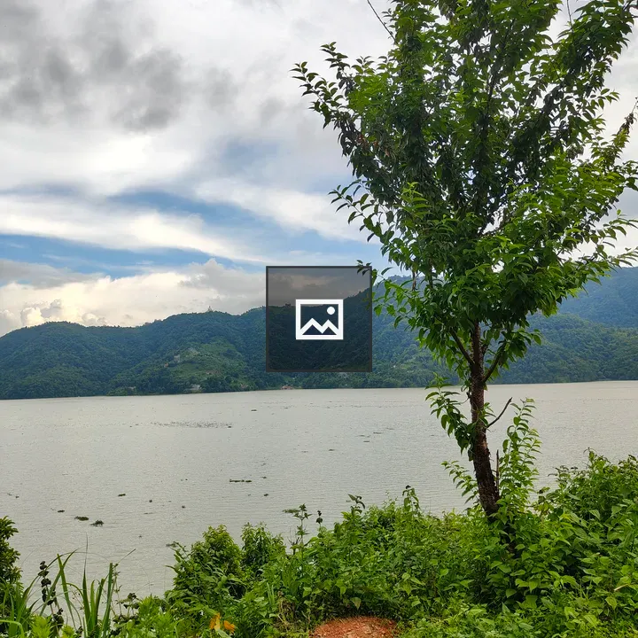 Calm water and green hills