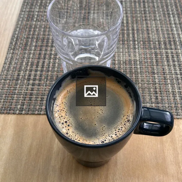 Coffee mug with frothy surface