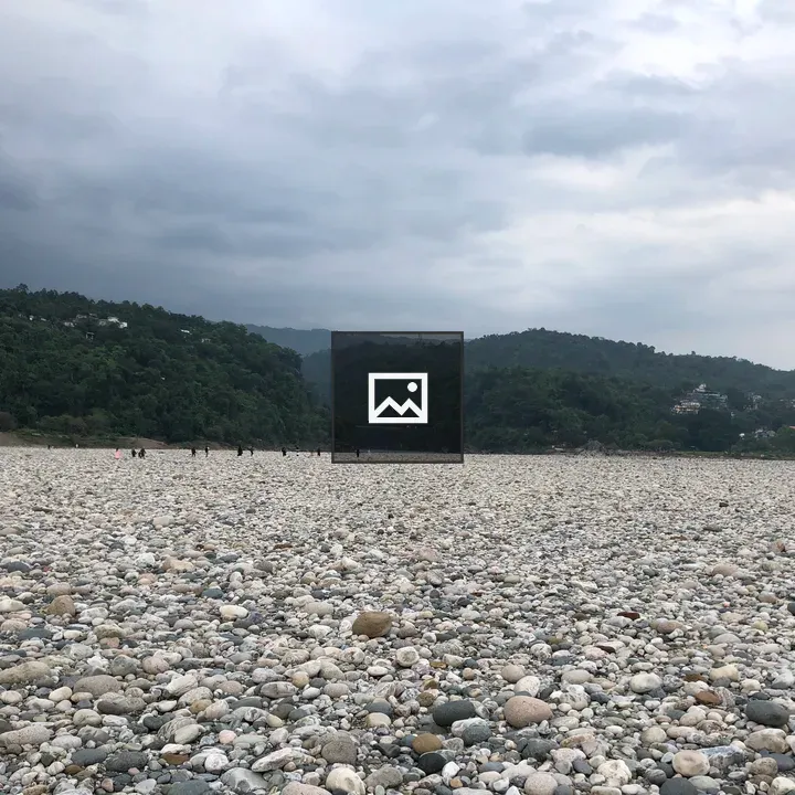 Field of Stones with Mountains