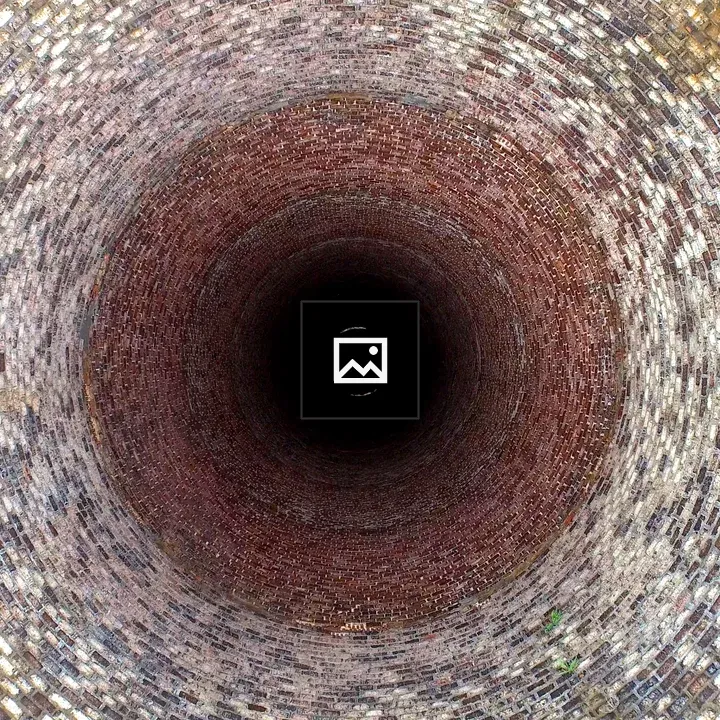 Disused power station chimney from above