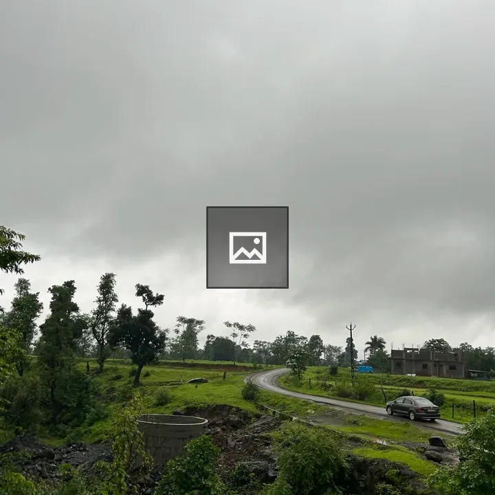 Overcast Sky and Winding Road