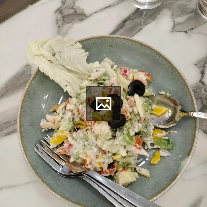 Chicken salad on light blue plate