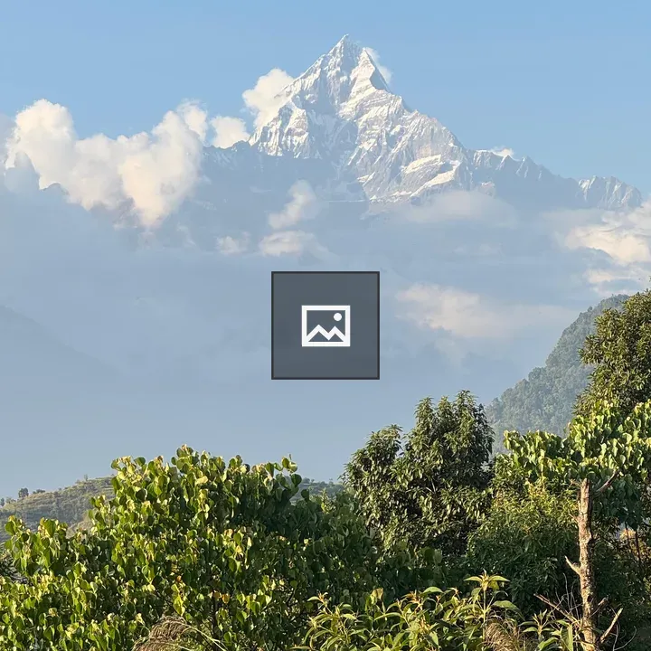 Snow-capped Peak in Clear Sky