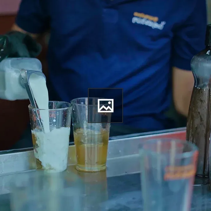 Milk Sarbath Pouring Scene