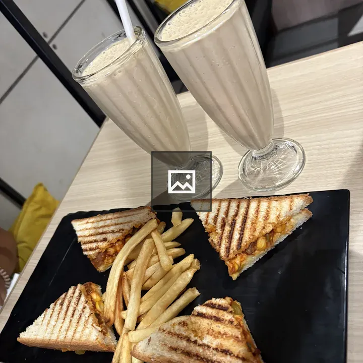 Breakfast with milkshakes and sandwiches