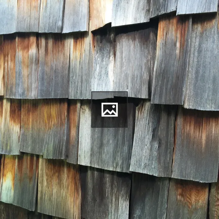 Old Wood Shingles on Building Siding